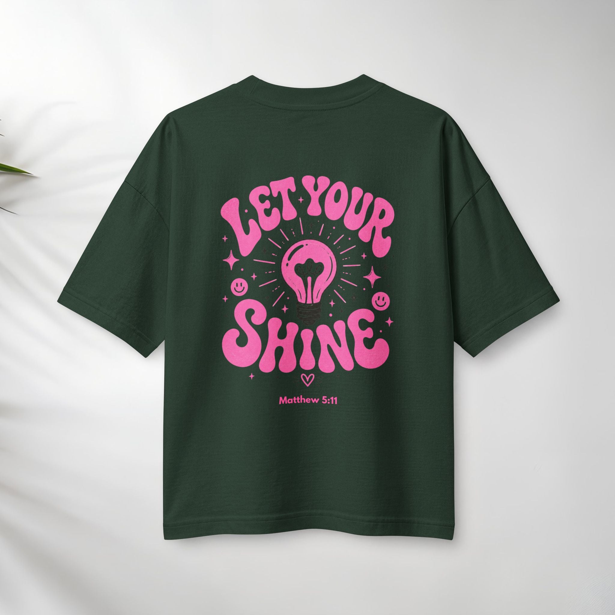 Let Your Shine T‑Shirt — Inspirational Pink Lightbulb Graphic (Matthew 5:16)